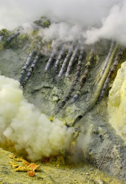 Extracting sulphur inside Kawa Ijen crater clipart