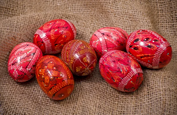 Easter Colorful Eggs on a gunny background — Stock Photo, Image