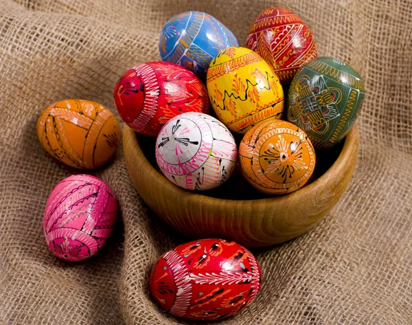 Easter Colorful Eggs on a gunny background — Stock Photo, Image