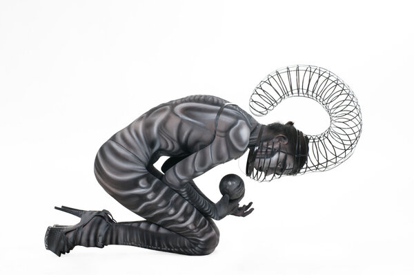 Portrait of an artistic woman painted colors. Body Art project.