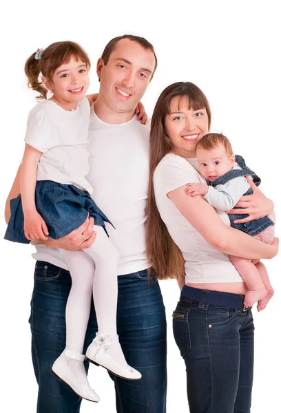 A father and mother are holding two their daughters — Stock Photo, Image