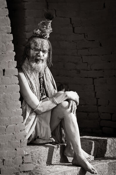 Sadhu with traditional painted face , Nepal