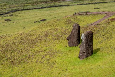 Moai statues at  Rano Raraku Volcano at Easter Island, Rapa Nui National Park, Chile clipart