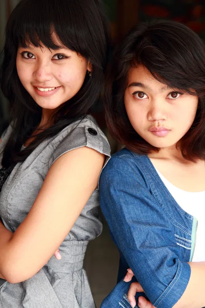 Two beautiful smiling young girls — Stock Photo, Image