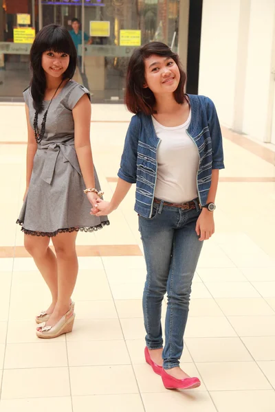 Two beautiful smiling young girls — Stock Photo, Image