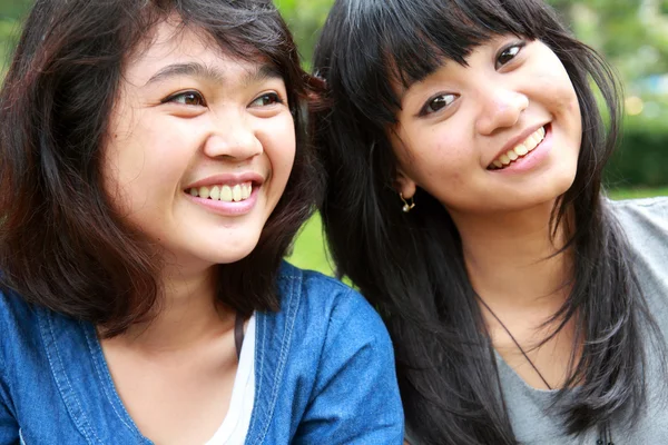 Two beautiful smiling young girls Stock Photo