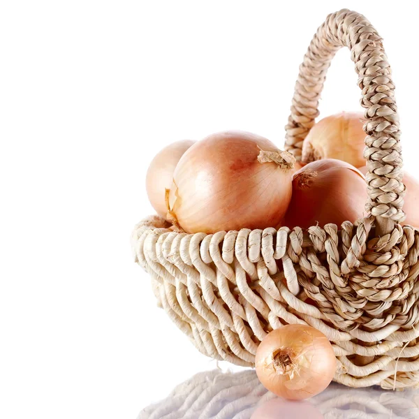 Onions napiform in a basket — Stock Photo, Image