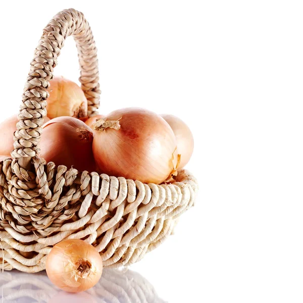Onions napiform in a basket — Stock Photo, Image