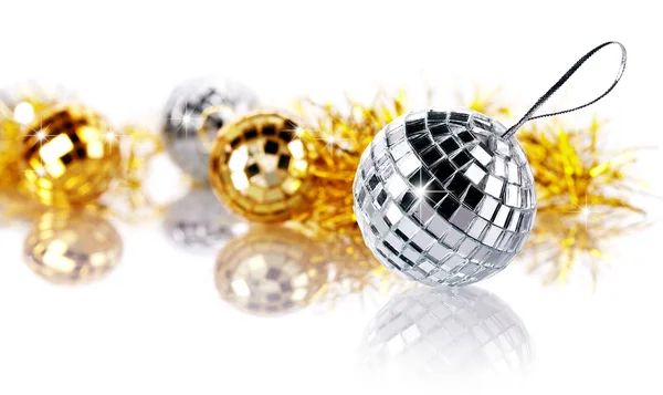 Mirror spheres and New Year's tinsel. — Stock Photo, Image