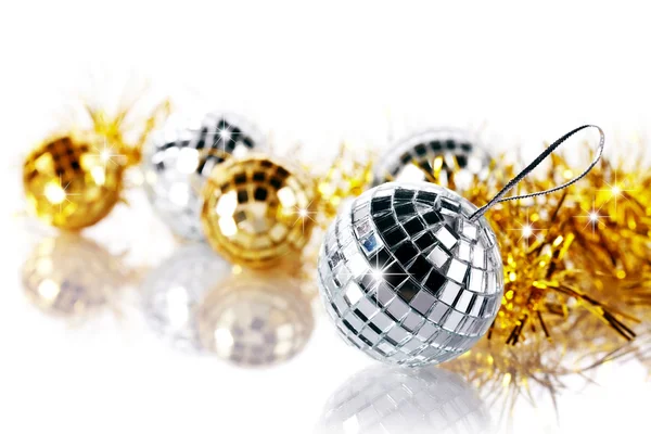 Mirror spheres and New Year's tinsel. — Stock Photo, Image