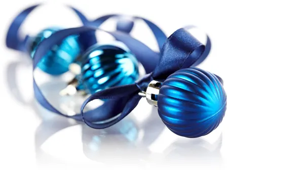 New Year's blue balls with a blue satin ribbon. — Stock Photo, Image