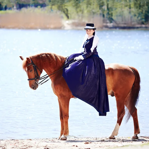 The lady on riding walk.