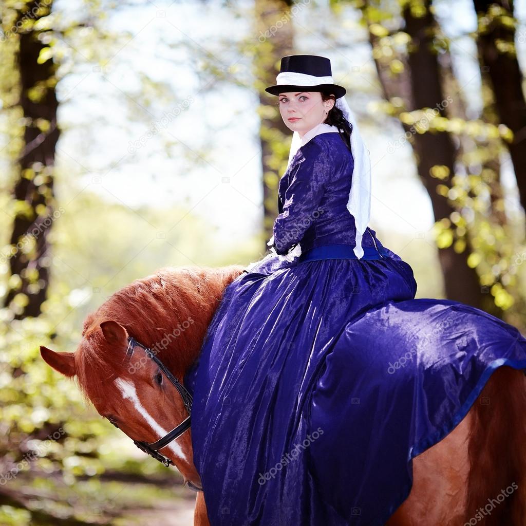 Portrait of the lady on a red horse.