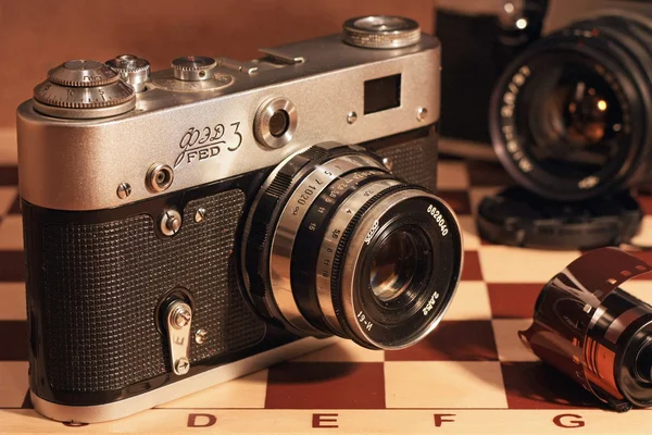 Vintage camera in een lederen tas — Stockfoto