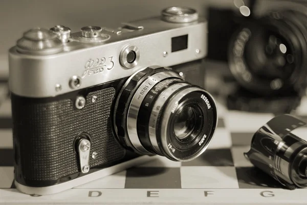 Vintage camera in een lederen tas — Stockfoto