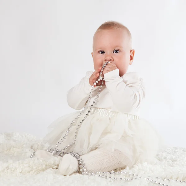 Little girl in skirt on white background — Stock Photo, Image