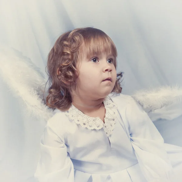 Thoughtful pretty girl with wings, christmas — Stock Photo, Image