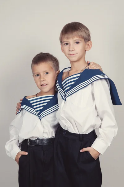 Portrait of two brothers in sailor suits — Stock Photo, Image