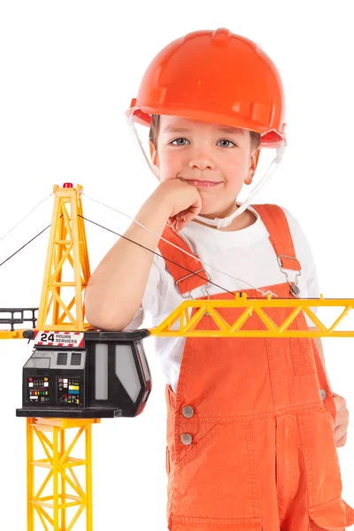 Portrait of boy in orange helmet, insulation — Stock Photo, Image