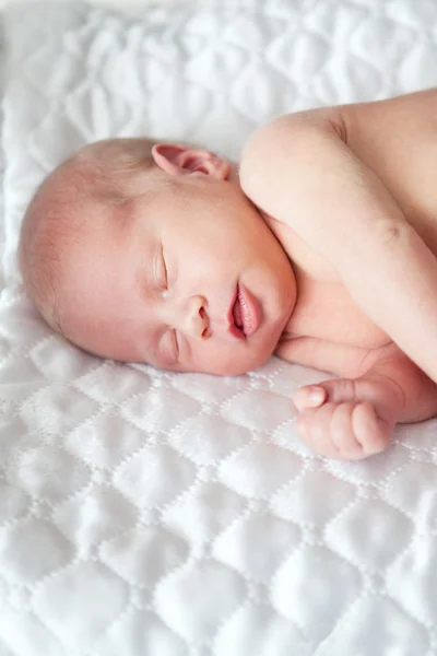 Portrait of sleeping newborn baby in room — Stock Photo, Image