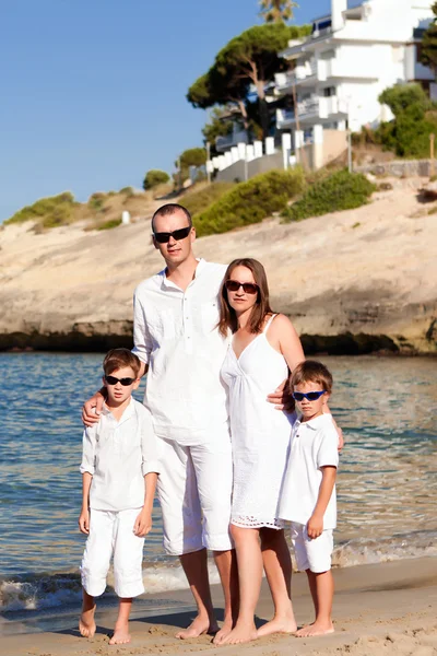 Young family with two kids on vacation — Stock Photo, Image