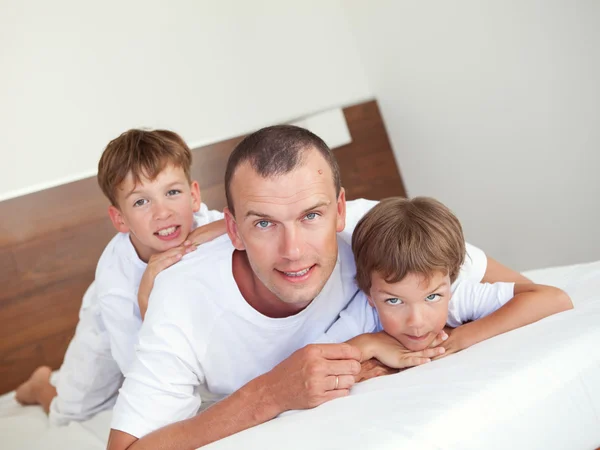 Portrait of happy father and sons Stock Image