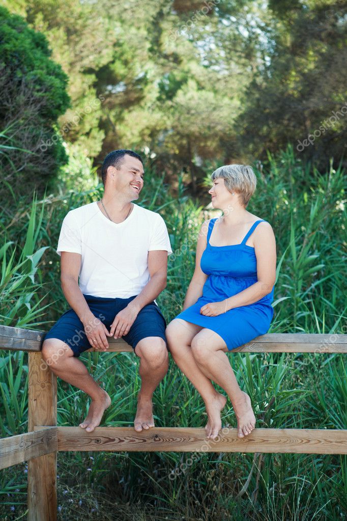 Outdoor couple watching amateur