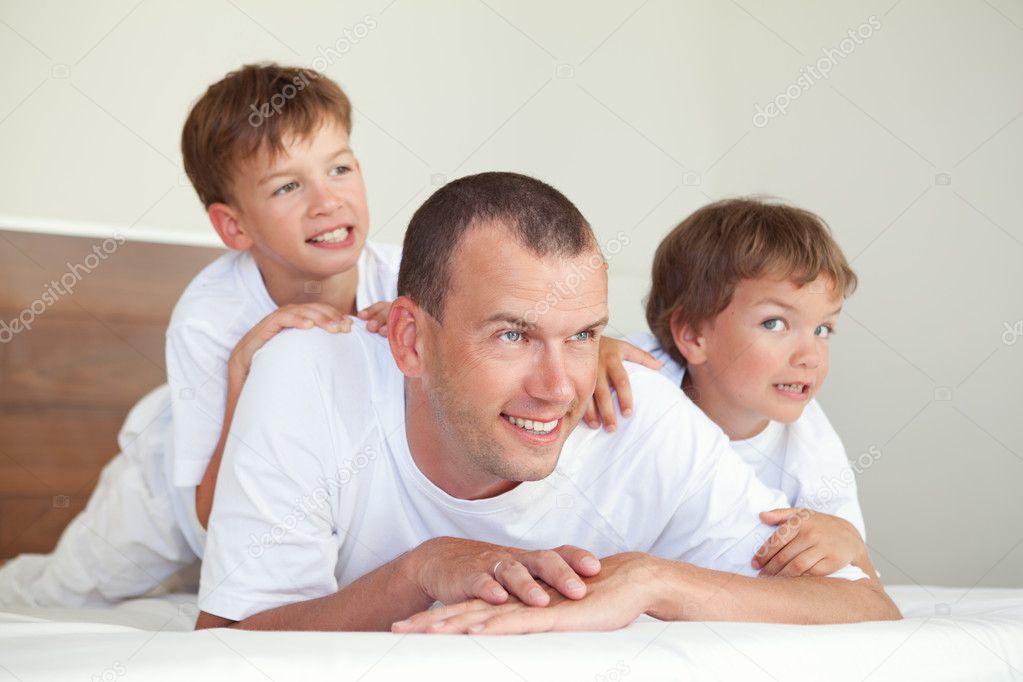 Portrait of happy father and sons