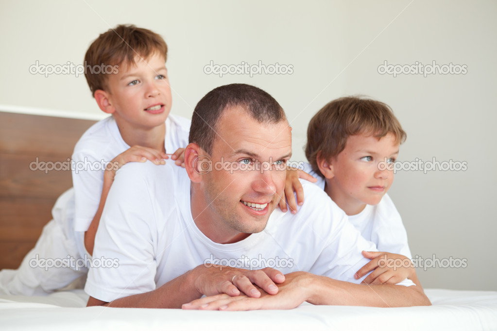 Portrait of happy father and sons