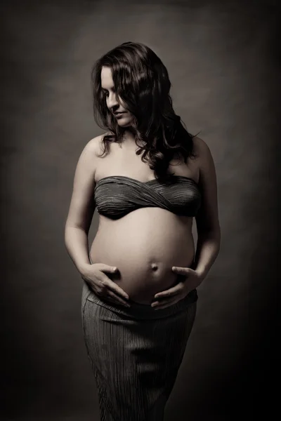 Portrait of beautiful pregnant woman in studio — Stock Photo, Image