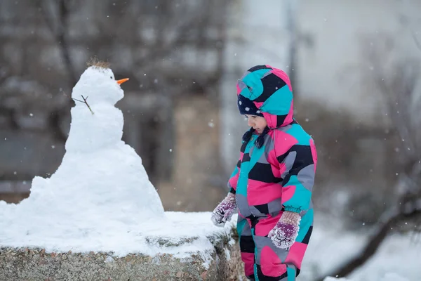 Girl Hugs Snowman Winter Walk Outdoor — Stock Photo, Image
