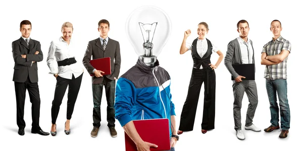 Verksamhet team med lampa huvud — Stockfoto