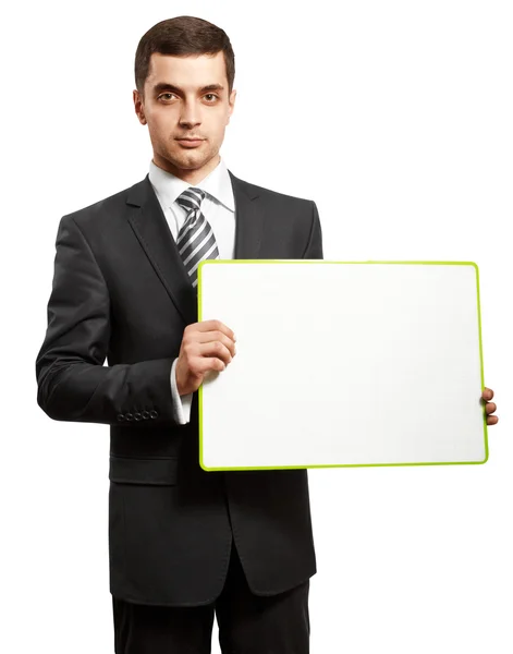 Hombre de negocios con tablero de escritura vacío — Foto de Stock