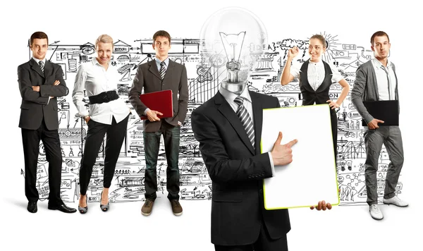 Business team with lamp head — Stock Photo, Image