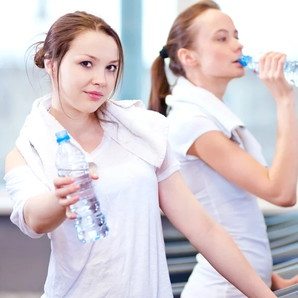 Women drinking water after sports — Stock Photo, Image