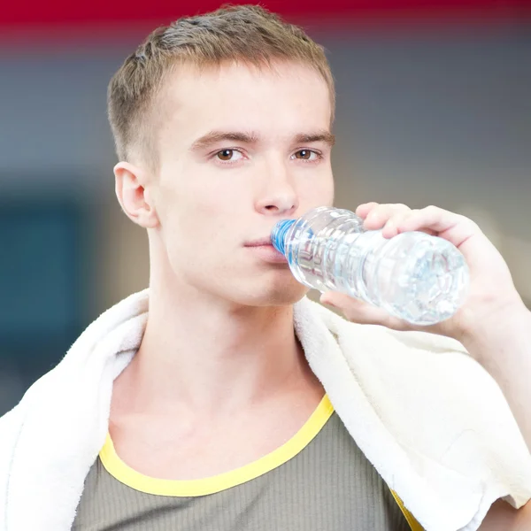 Man drinking water after sports — Stock Photo, Image