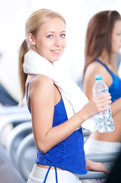 Women drinking water after sports — Stock Photo, Image