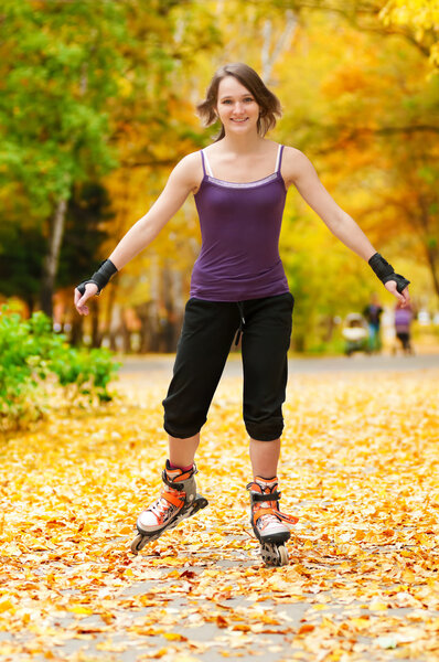 Woman on roller skates in the park