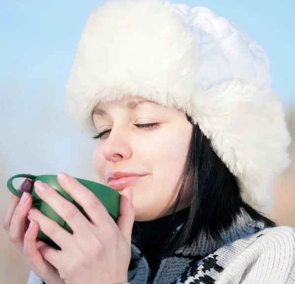 Teenage girl with cup of hot tee — Stock Photo, Image