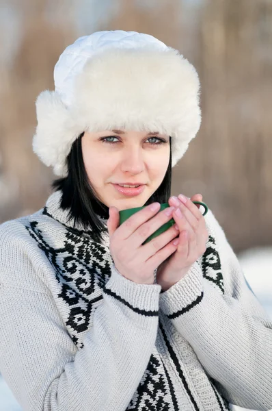 Teenage girl with cup of hot tee — Stock Photo, Image