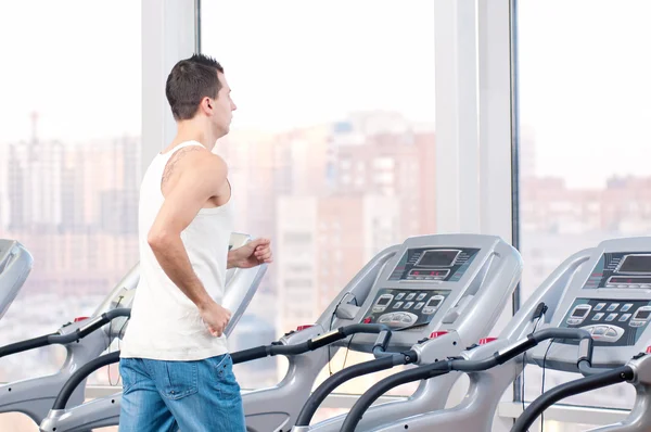Man at the gym exercising. Run. — Stock Photo, Image