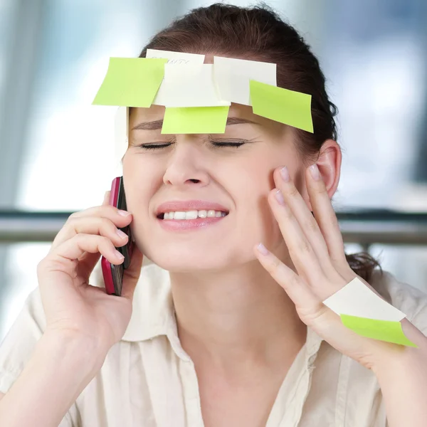 Business woman with stickers — Stock Photo, Image