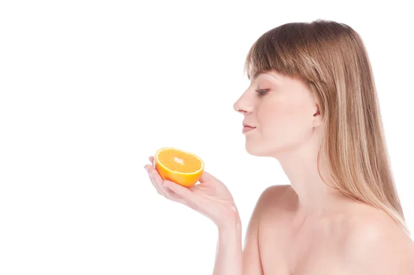 Young beauty woman with orange — Stock Photo, Image