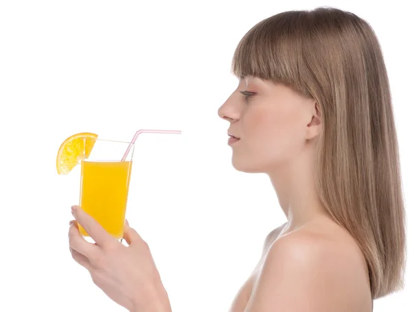 Jovem mulher de beleza com suco de laranja — Fotografia de Stock