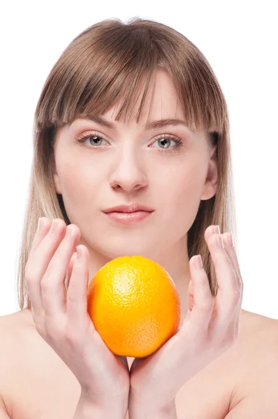 Young beauty woman with orange — Stock Photo, Image