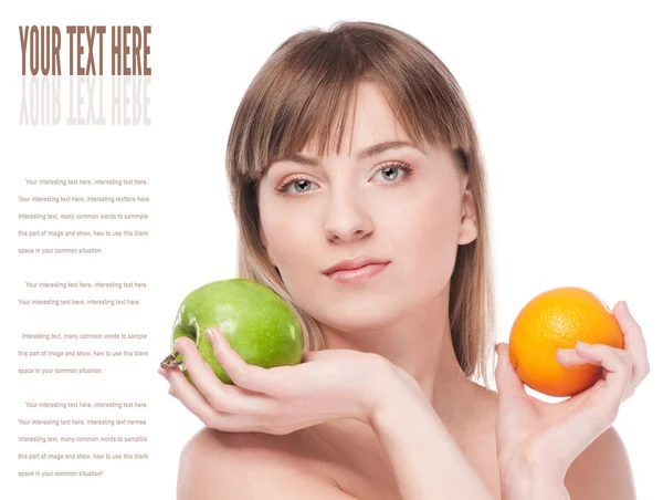 Young beauty woman with green apple and orange — Stock Photo, Image