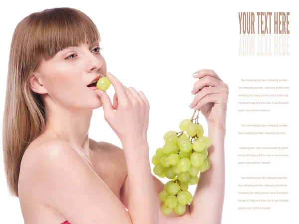 Beautiful young woman with green grape — Stock Photo, Image