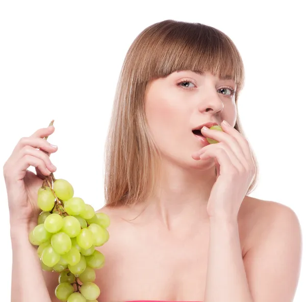 Beautiful young woman with green grape — Stock Photo, Image