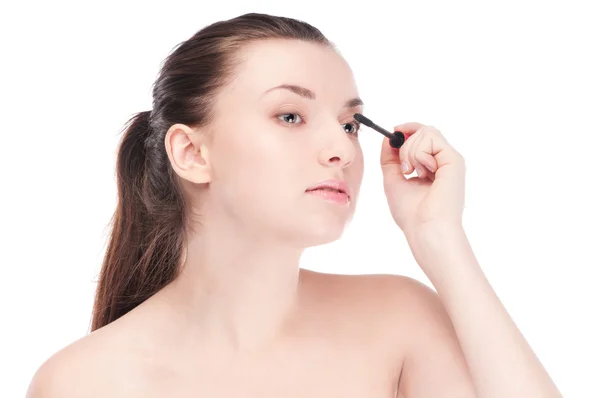 Hermosa mujer con maquillaje cepillo — Foto de Stock