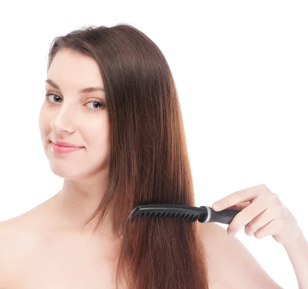 Bella donna con spazzola per capelli — Foto Stock